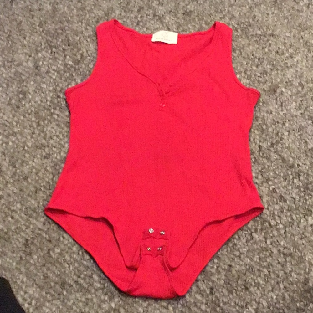 Hyped Unicorn red ribbed bodysuit with button v-neck snaps at bottom